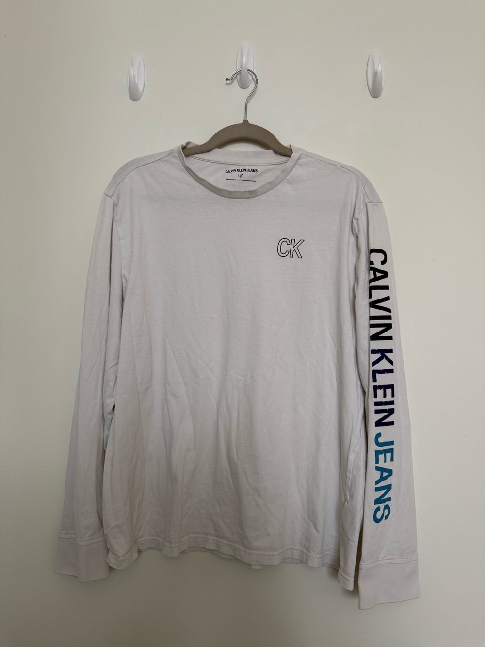 Calvin Klein White Long Sleeve Tee with Black & Blue Sleeve Logo
